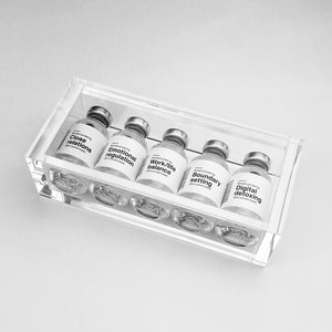 Clear acrylic display for 5 bottles